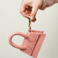 The Dog Musthaves Designer Bag - Beloningstasje voor hondenkoekjes en poepzakdispenser - Roze